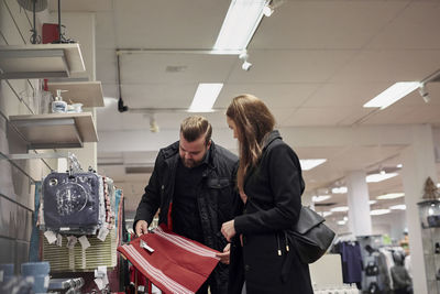 Couple shopping in department store