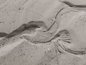 High angle view of sand at beach