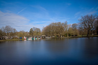 Scenic view of lake against blue sky