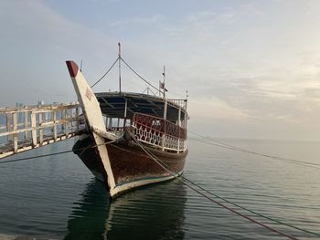 Boat in sea against sky