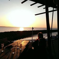 Scenic view of sea at sunset