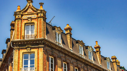 Low angle view of historic building against clear sky