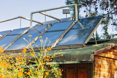 Solar system of roof against sky