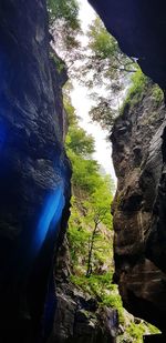 Low angle view of rock formation against blue sky