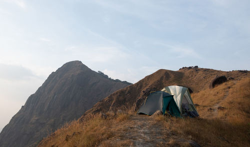 Tent spread on the top of the mountain morning clear weather