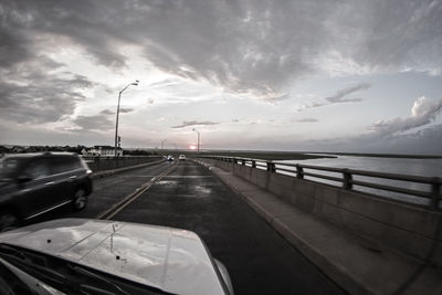 View of road against cloudy sky