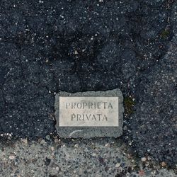 Close-up of text on wall