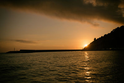 Scenic view of sea against sky during sunset