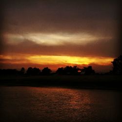 Scenic view of sea at sunset