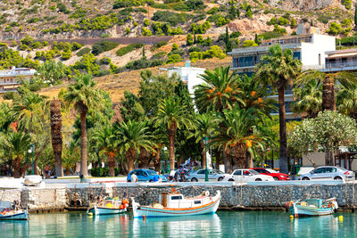 Sailboats moored in sea