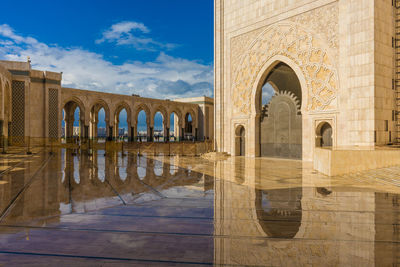 Reflection of hassan ii mosque on flooring