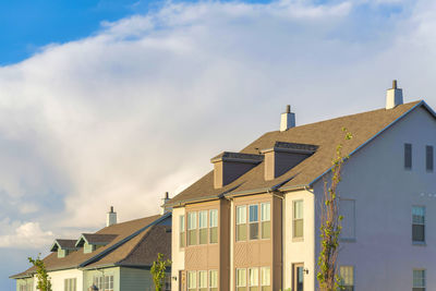 Buildings in city against sky