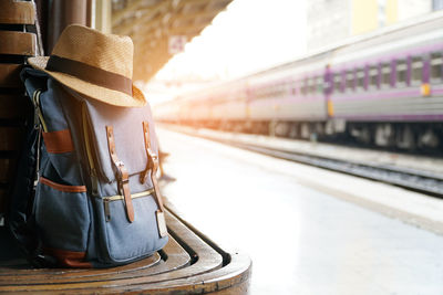 Train at railroad station platform against sky