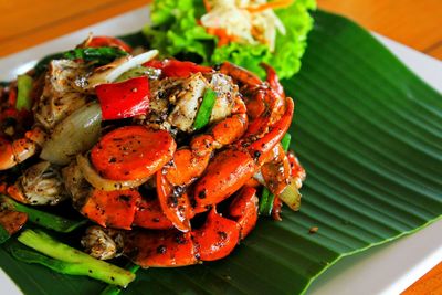 High angle view of fried crab with black pepper