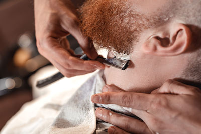 Close-up of man smoking