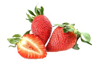 Close-up of strawberry against white background