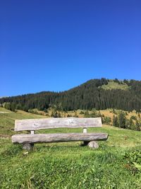 Scenic view of landscape against clear blue sky