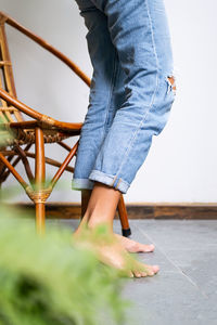 Low section of man standing on floor