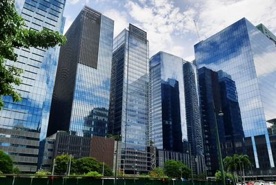 Low angle view of skyscrapers against sky