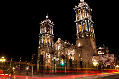 Low angle view of illuminated building at night