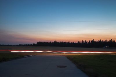 Light trails on road at night