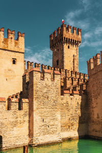 View of the scaliger castle in sirmione on lake garda in italy.