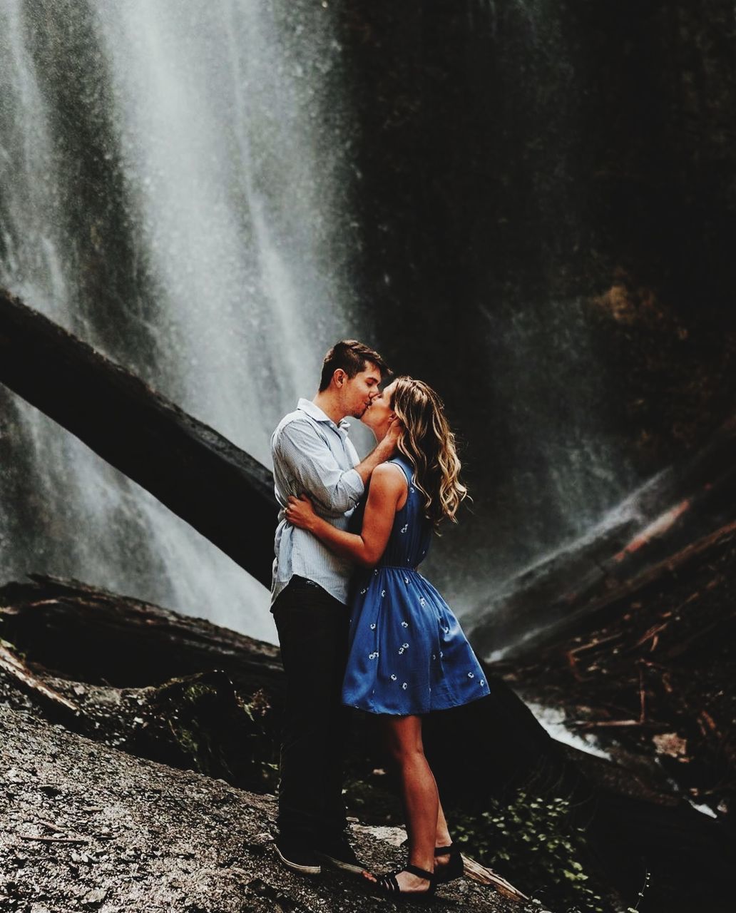 two people, women, full length, real people, togetherness, waterfall, casual clothing, love, bonding, nature, people, standing, lifestyles, adult, leisure activity, females, motion, couple - relationship, emotion, long exposure, outdoors, flowing water, positive emotion, flowing