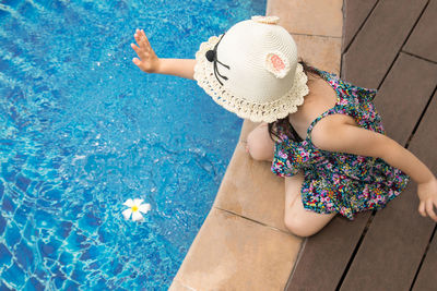 High angle view of woman in swimming pool