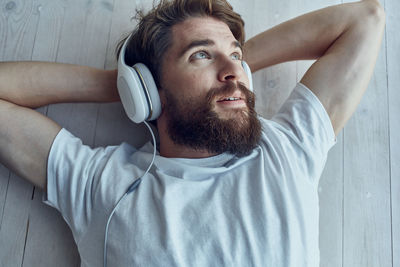 Portrait of young man looking away