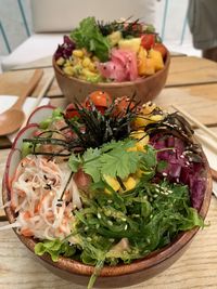 High angle view of chopped vegetables in plate on table