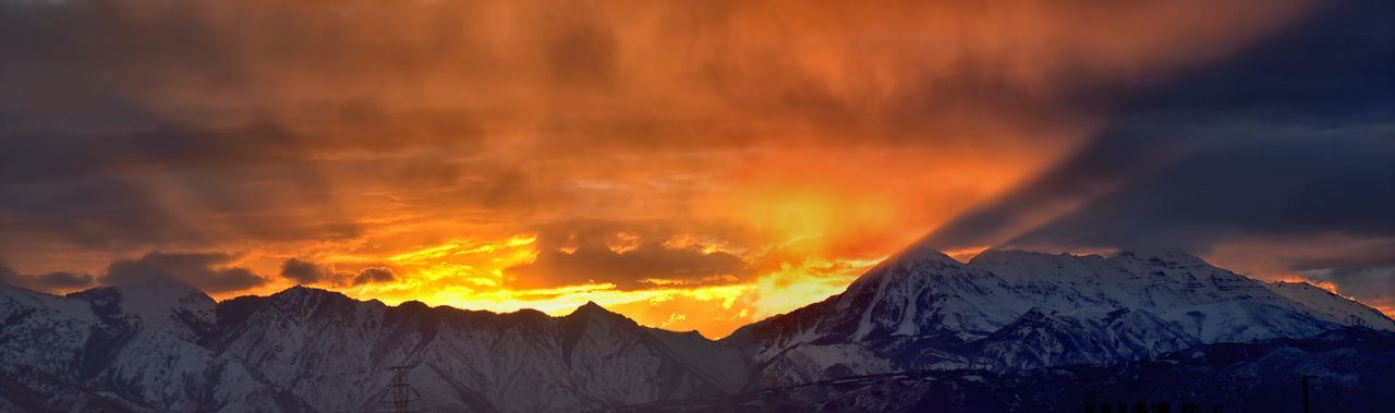 SCENIC VIEW OF MOUNTAINS AGAINST SKY DURING SUNSET