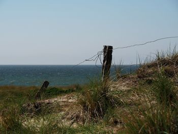 Scenic view of sea against clear sky