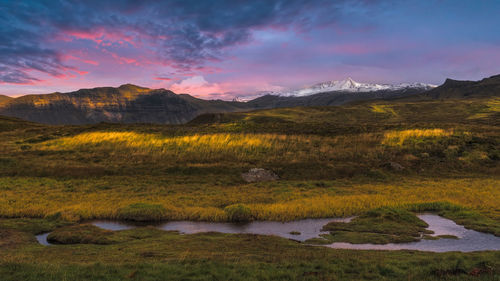 Enchanting sunset overlooking snowcapped mountains near grundarfjörður in north coast of iceland