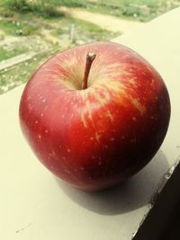 High angle view of apple on table