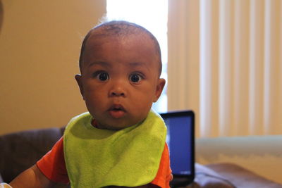 Portrait of cute boy at home
