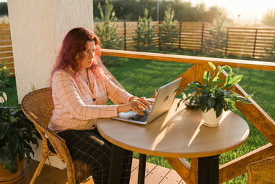 Young woman using mobile phone