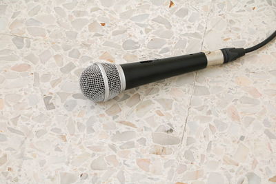 High angle view of microphone on floor