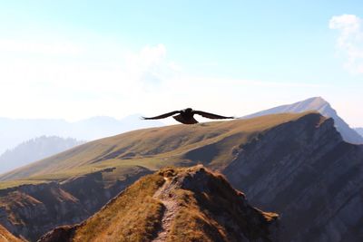 Scenic view of mountain range against sky