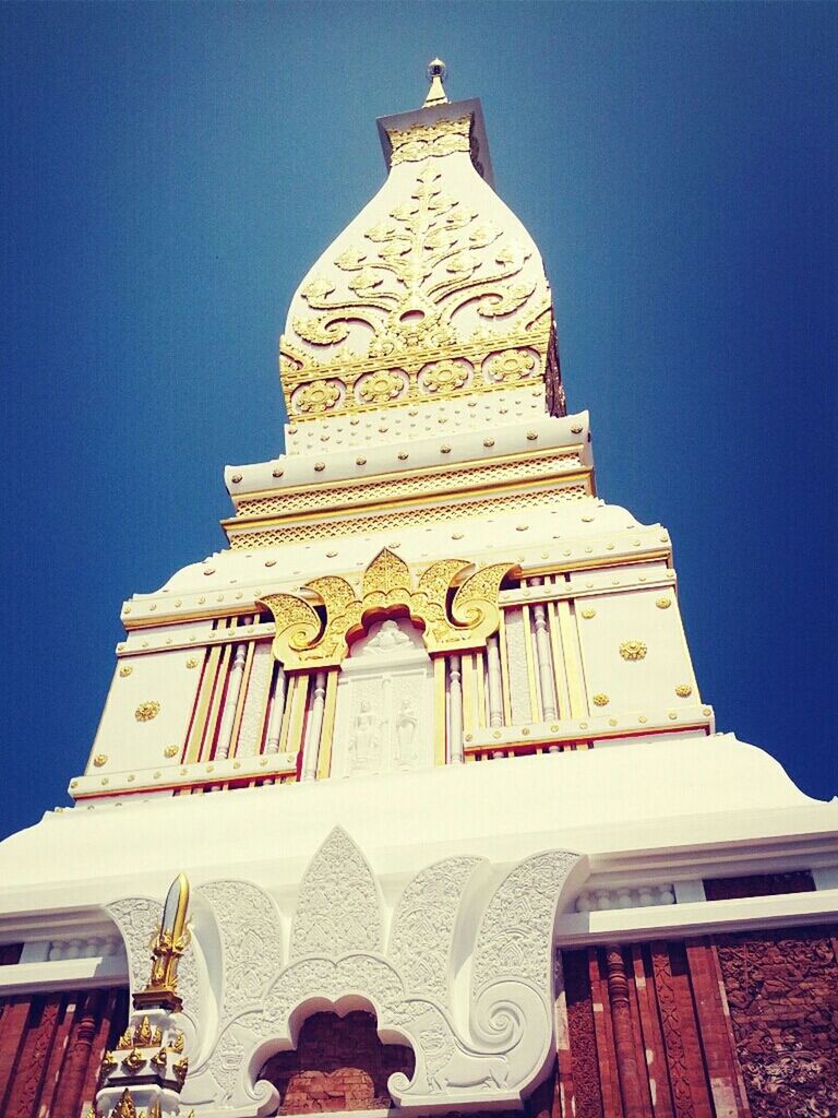 religion, place of worship, clear sky, architecture, building exterior, spirituality, famous place, built structure, low angle view, travel destinations, blue, tourism, travel, international landmark, sculpture, art and craft, statue, human representation, art