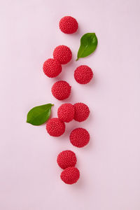 Close-up of strawberry over white background