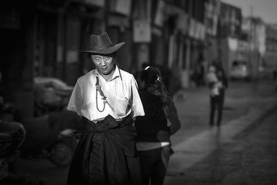 Young woman standing in park