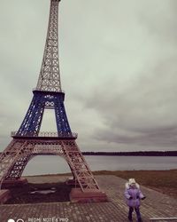 View of tower against cloudy sky