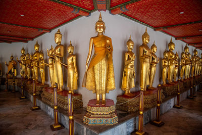 Panoramic shot of statues in building