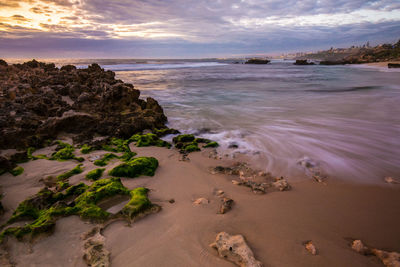 Scenic view of sea against cloudy sky