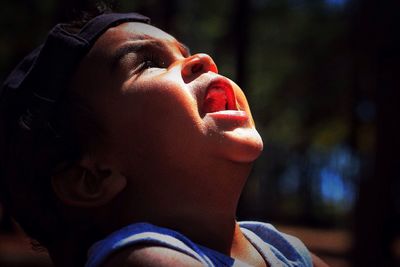 Close-up of boy with eyes closed