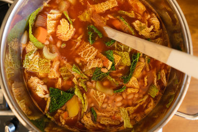 Directly above shot of soup in bowl on table