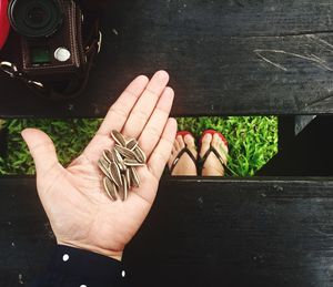 Close-up of hand holding eyeglasses