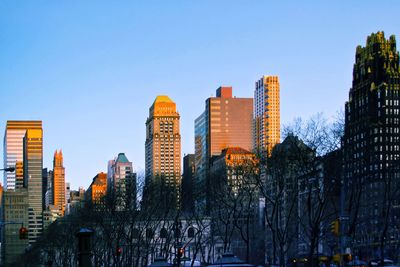 Panoramic view of modern buildings against sky in city