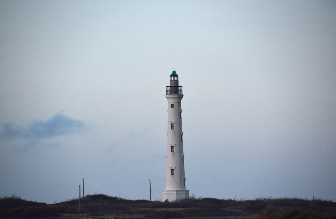 guidance, lighthouse, tower, architecture, built structure, building exterior, security, protection, building, sky, nature, no people, beach, land, travel destinations, travel, observation tower, environment, water, sea, communication, outdoors, day, cloud, landscape, scenics - nature, coastline