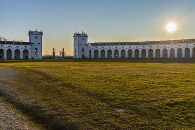 Sunset between the columns. ancient residence of the doge of venice. udine. italy